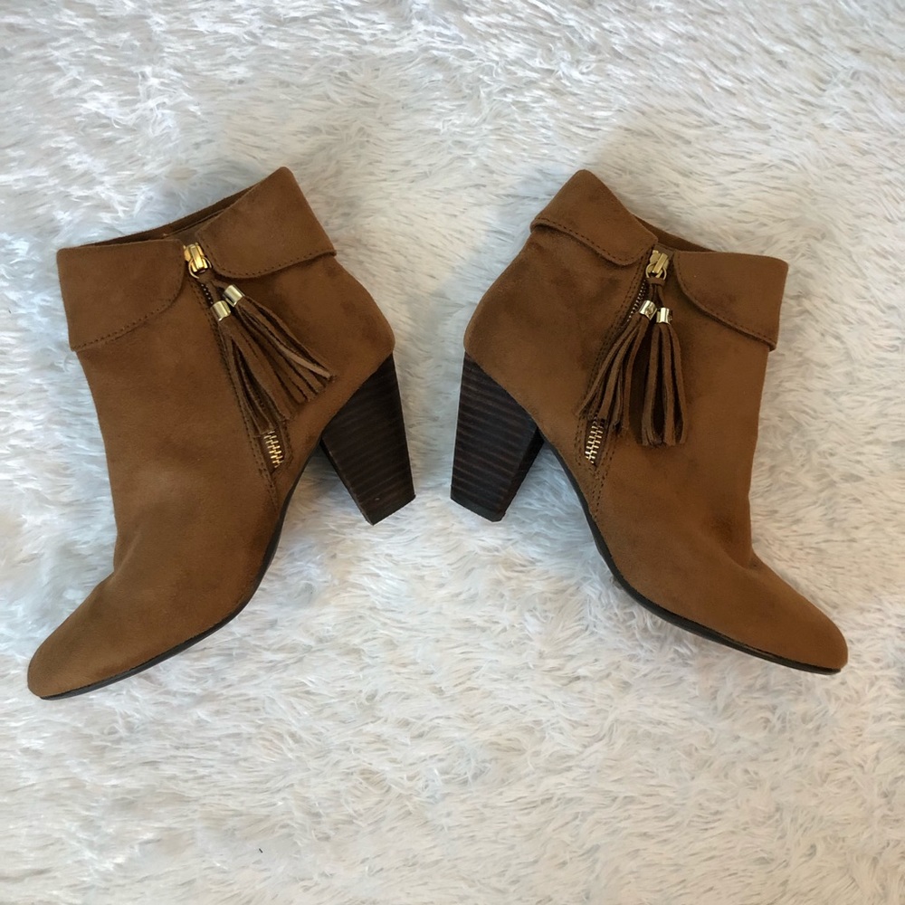 Ankle Boots with fringe zipper detail.